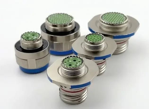 MIL-DTL-38999 Series III circular connectors assortment with plugs and receptacles on white background